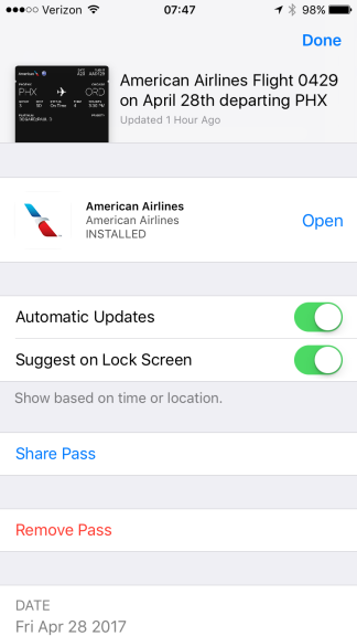 Wallet app boarding pass details showing a 'Share Pass' button.