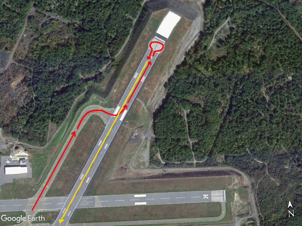 Aerial image of AVP runway 22 turnaround, showing taxi and takeoff path.