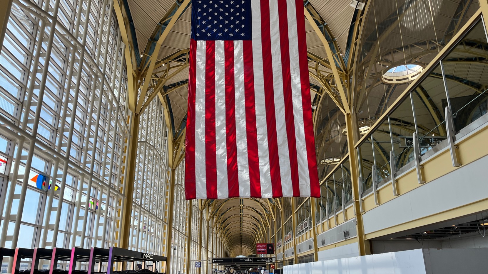 U.S. flag hanging in the main arched hallway of DCA.