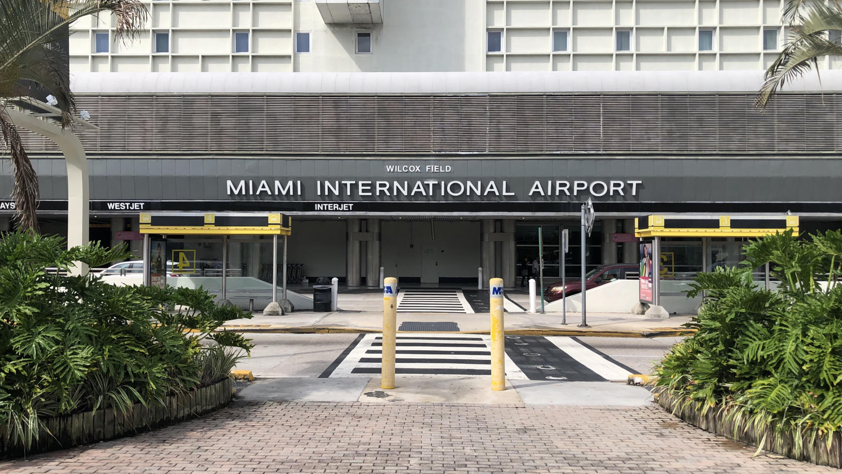 Miami International Airport sign on departures loop.
