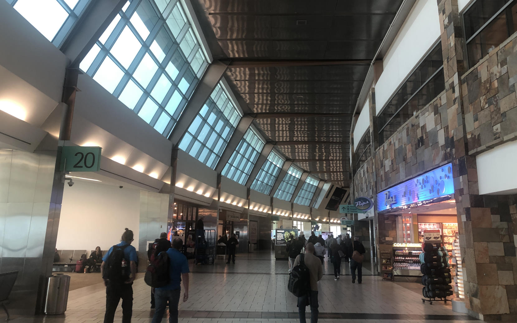 The curved airside concourse inside OKC.