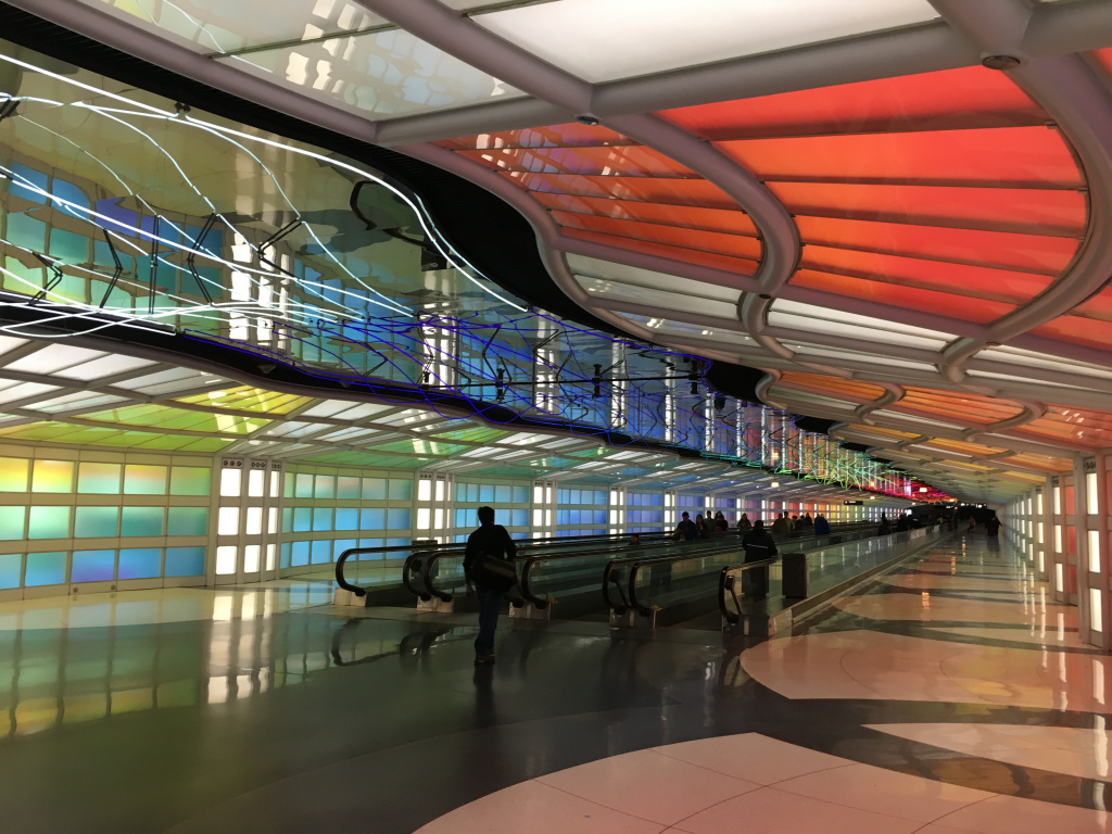 The neon tunnel between Concourses B and C at ORD.