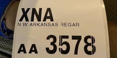 AA baggage sticker: N W Arkansas