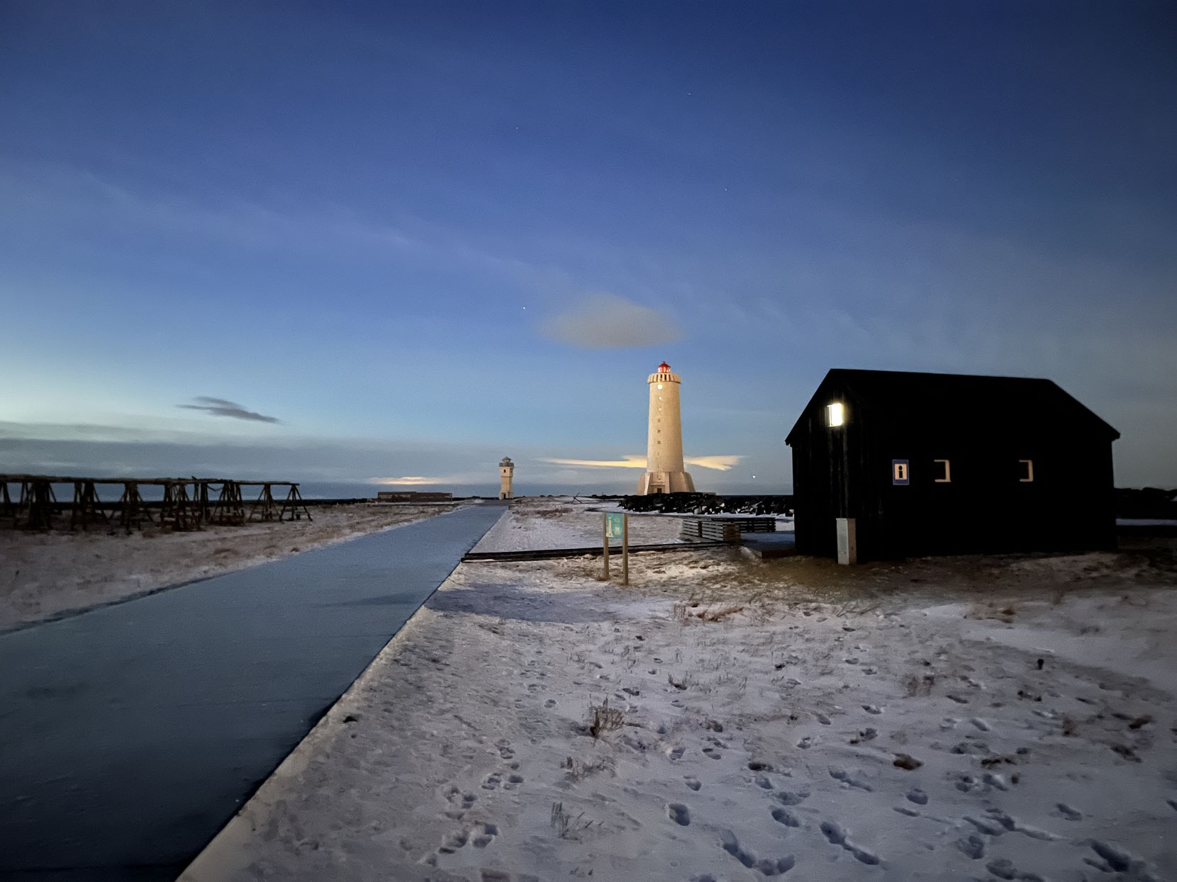 Two lighthouses on a peninsula.