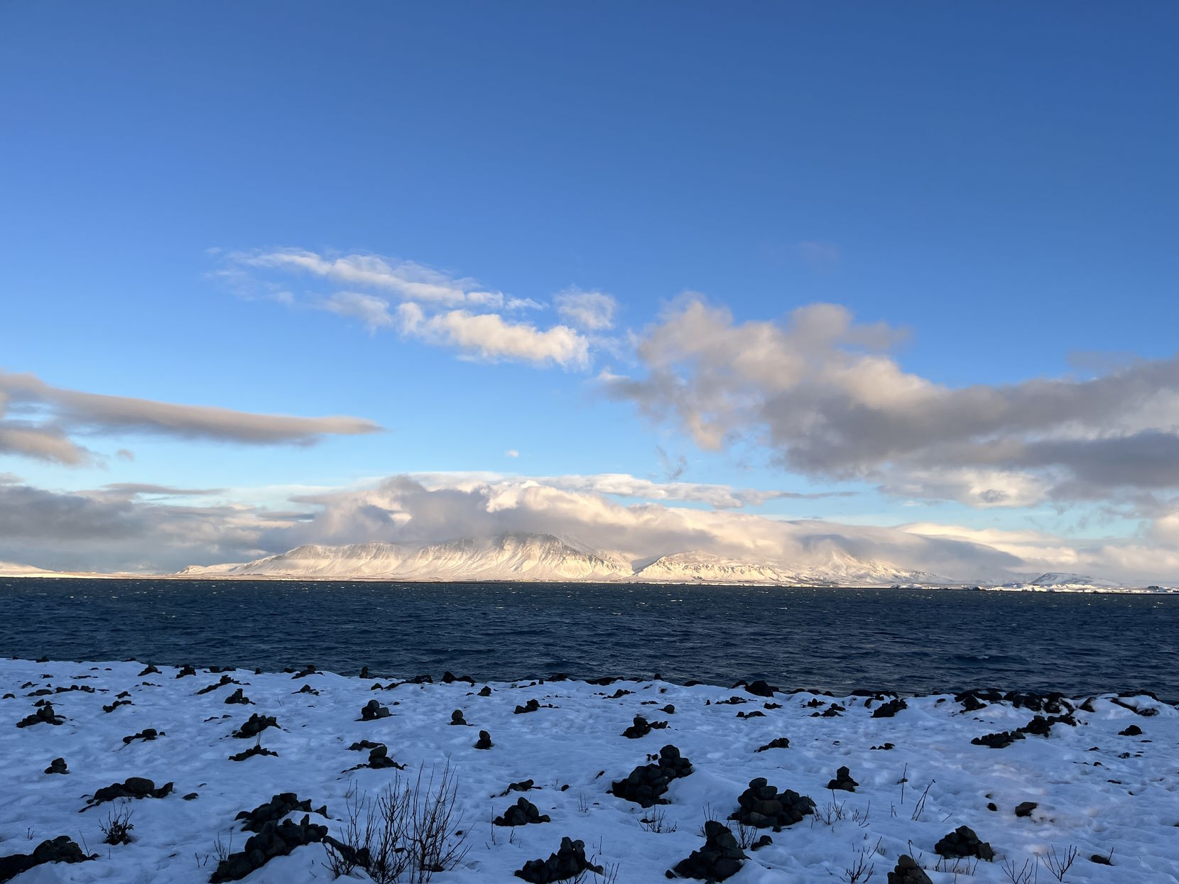 View of Kollafjörður Bay looking north from Reykjavík, with mountains at the far side of the bay.