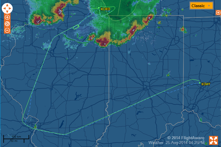 FlightAware map showing a track from KDAY west to St. Louis and northeast to KORD.