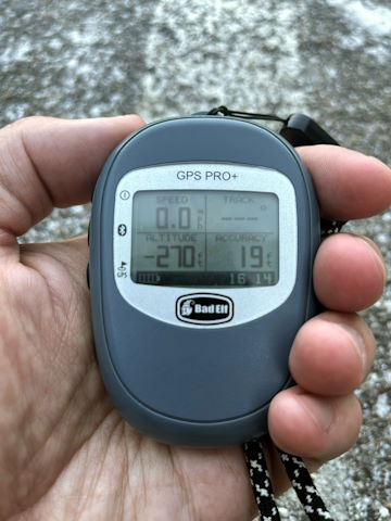 A handheld GPS showing an altitude of negative 270 feet, with 19 foot accuracy.